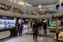 Shoppers look for last-minute holiday gifts on Saturday, Dec. 24, 2022, at Meadows Mall in Las ...