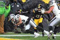 Las Vegas Raiders wide receiver Hunter Renfrow (13) dives for a touchdown with Pittsburgh Steel ...