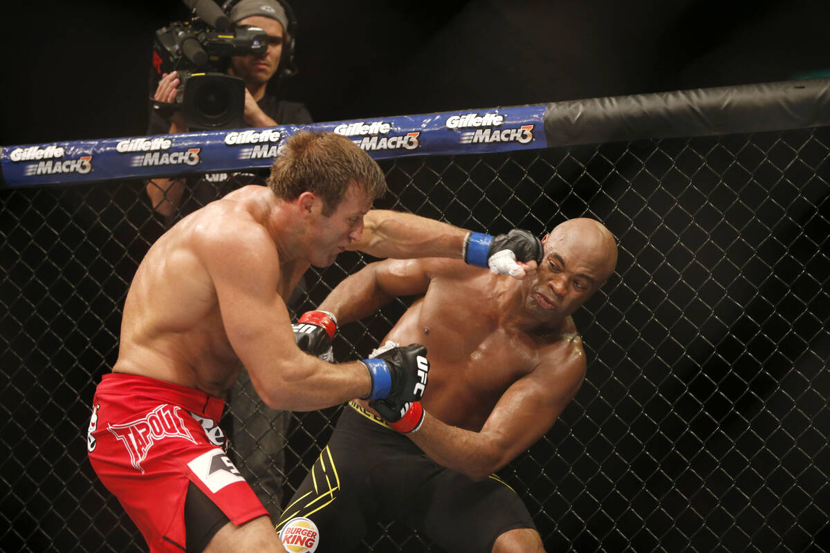FILE - Anderson Silva, right, of Brazil, fights Stephan Bonnar, of the United States, during th ...