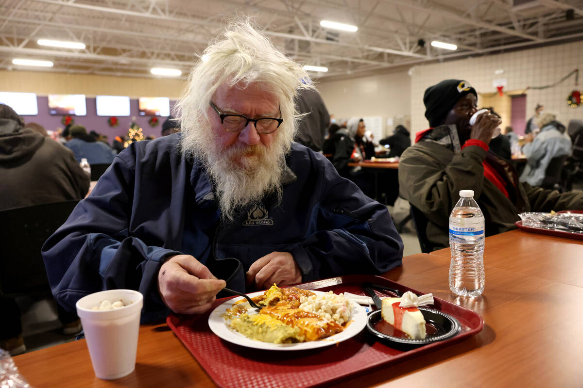 Edward Swallows, 58, eats a Christmas meal at Catholic Charities of Southern Nevada in Las Vega ...