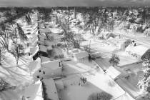 In this drone image, snow blankets a neighborhood, Sunday, Dec. 25, 2022, in Cheektowaga, N.Y. ...