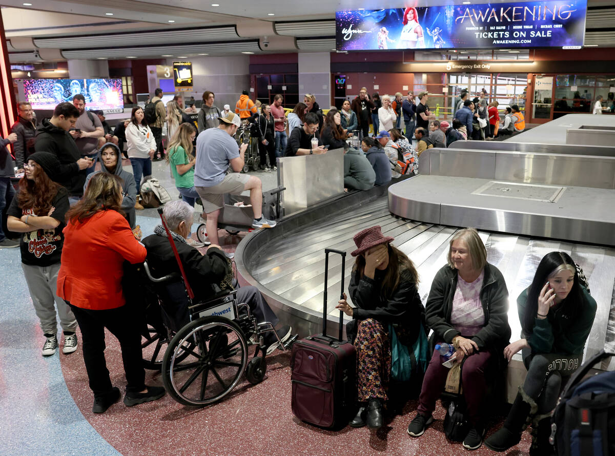 Travelers, including seated from left, Janis Ranta of Reno, Margo O’Connor of Clovis, Calif. ...
