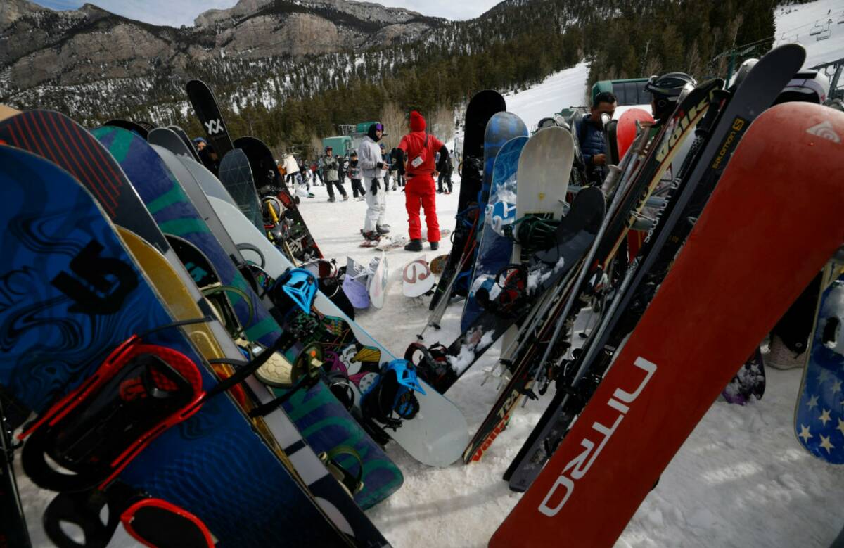 Skiers and snowboarders enjoy the slope as people ride chairlifts, Monday, Dec. 26, 2022, at th ...