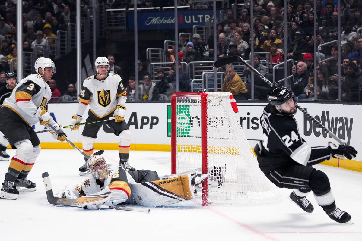 Vegas Golden Knights goaltender Logan Thompson (36) watches as Los Angeles Kings' Phillip Danau ...