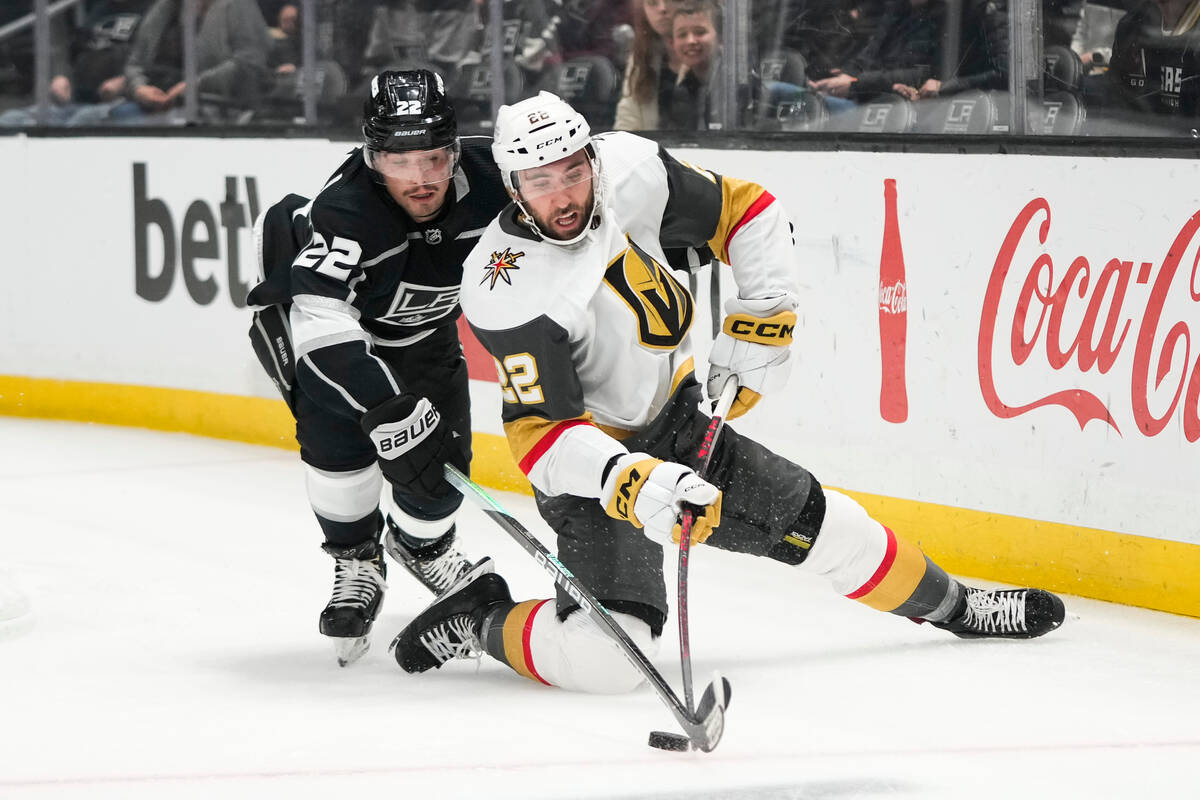 Vegas Golden Knights' Michael Amadio, right, and Los Angeles Kings' Kevin Fiala vie for the puc ...