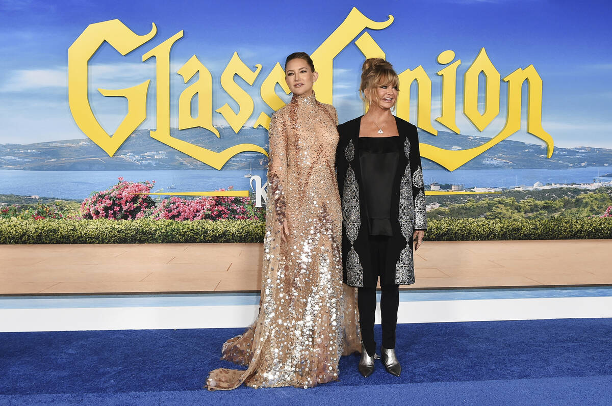 Kate Hudson, left, and Goldie Hawn arrive at the premiere of "Glass Onion: A Knives Out Mystery ...