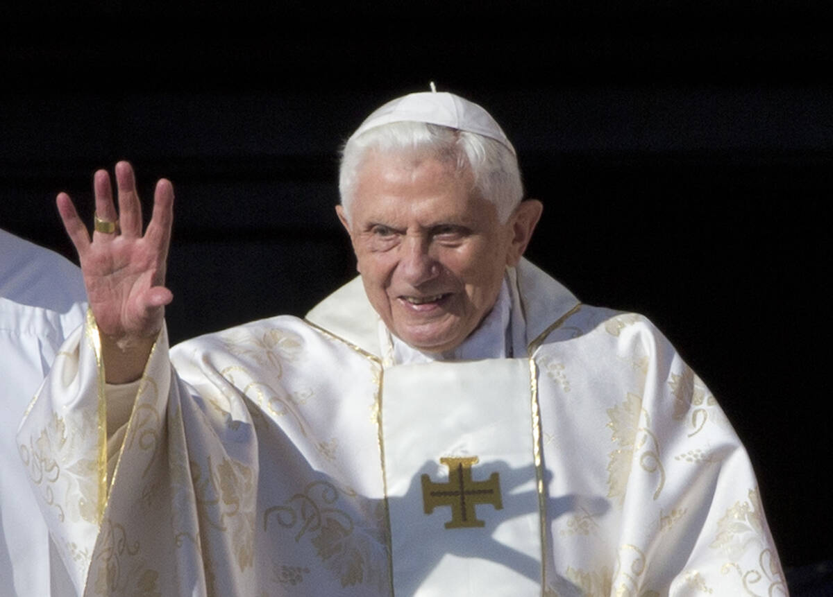 FILE - Pope Emeritus Benedict XVI arrives in St. Peter's Square at the Vatican to attend the be ...