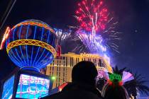 Fireworks explode over the Las Vegas Strip during New Year's celebrations, Friday, Dec. 31, 202 ...