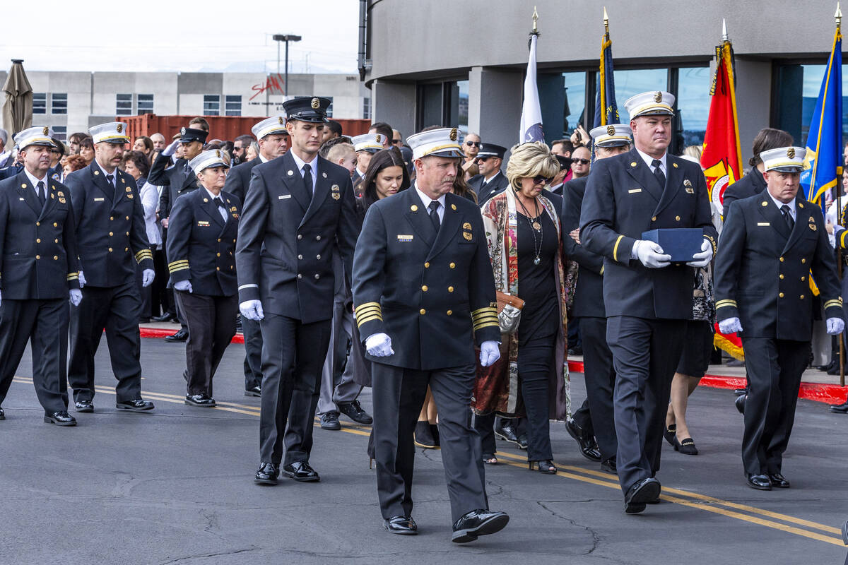 The ashes of Henderson Fire Department Engineer Clete Najeeb Dadian are carried in a procession ...