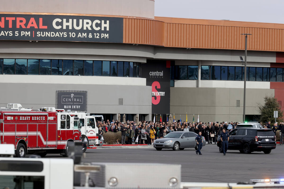 Mourners wait for a memorial procession for Henderson Fire Department Engineer Clete Najeeb Dad ...