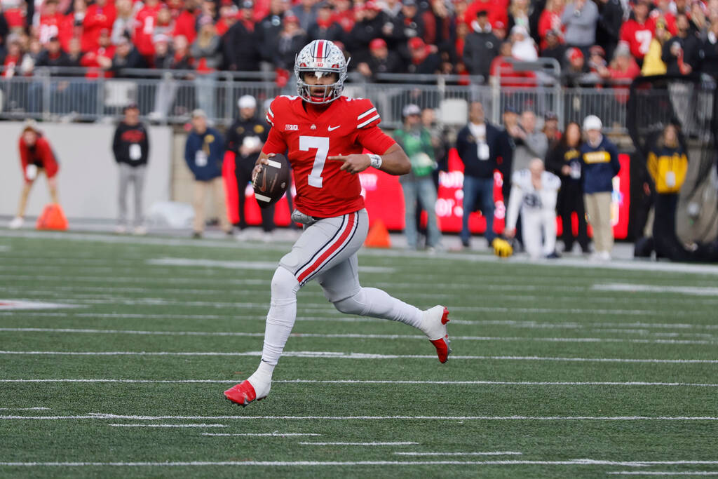 Ohio State quarterback C.J. Stroud plays against Michigan during an NCAA college football game ...