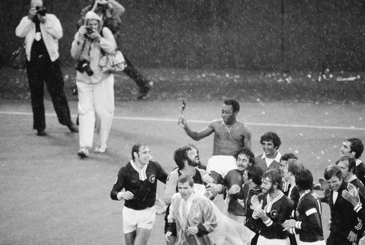 Pele is carried off the Giants Stadium field by his New York Cosmos teammates after his final s ...