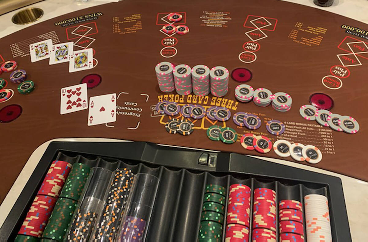 The poker table showing Jeff Reeves' royal flush in Three Card Poker that won him nearly $500,0 ...