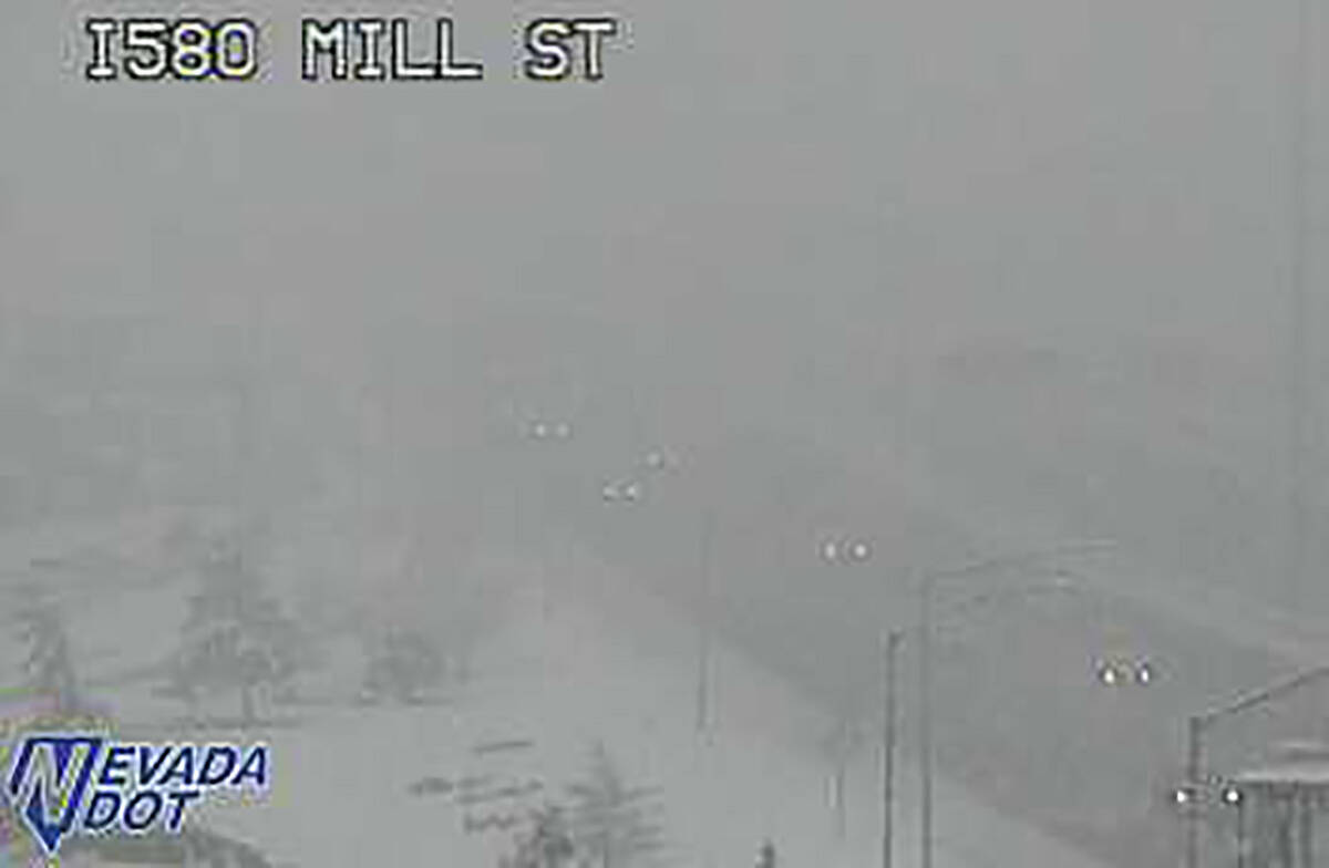 Fog and snow in Reno at the Interstate 580-Mill Street intersection about 2:30 p.m. Saturday, D ...