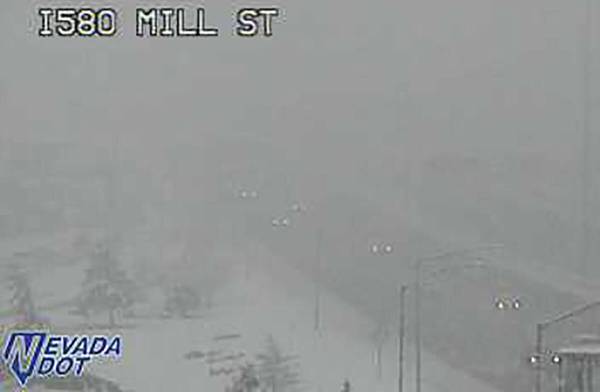 Fog and snow in Reno at the Interstate 580-Mill Street intersection about 2:30 p.m. Saturday, D ...