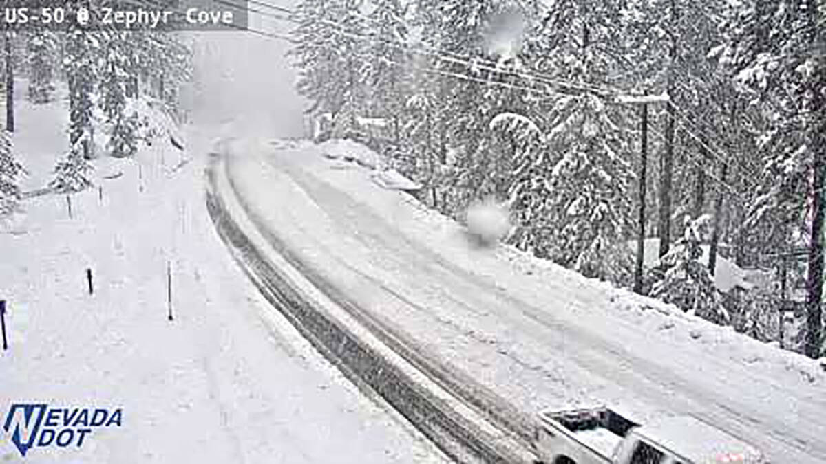 Much of U.S. 50 is covered with snow at Zephyr Cove in western Nevada about 2:30 p.m., Saturday ...