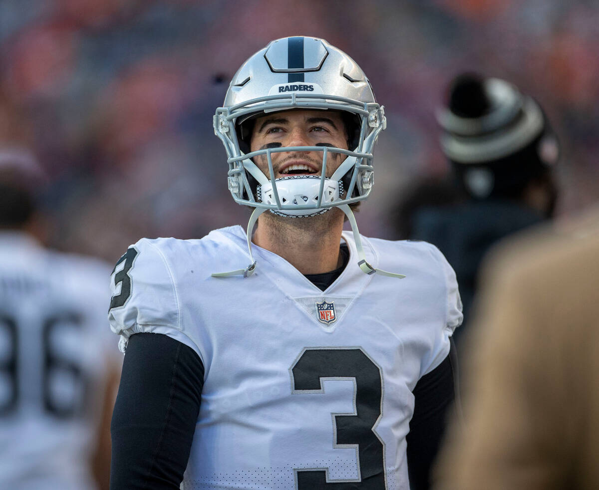 Raiders quarterback Jarrett Stidham (3) watches a replay during the second half of an NFL game ...