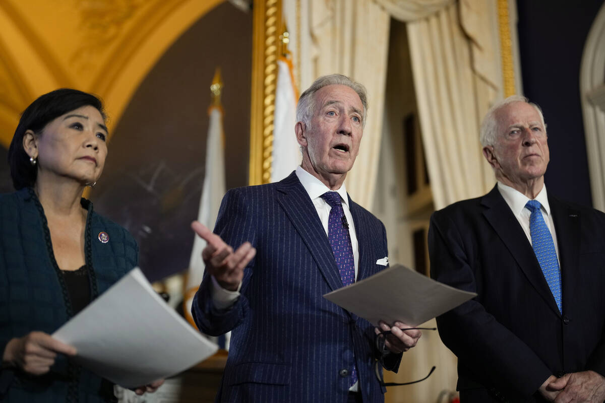 FILE - House Ways and Means Committee Chairman Richard Neal, D-Mass., talks to the media after ...