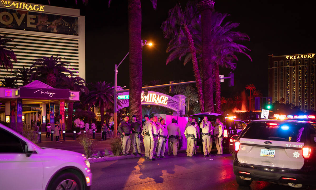 Las Vegas police officers close down the Strip on Saturday, Dec. 31, 2022, in Las Vegas. (Amaya ...