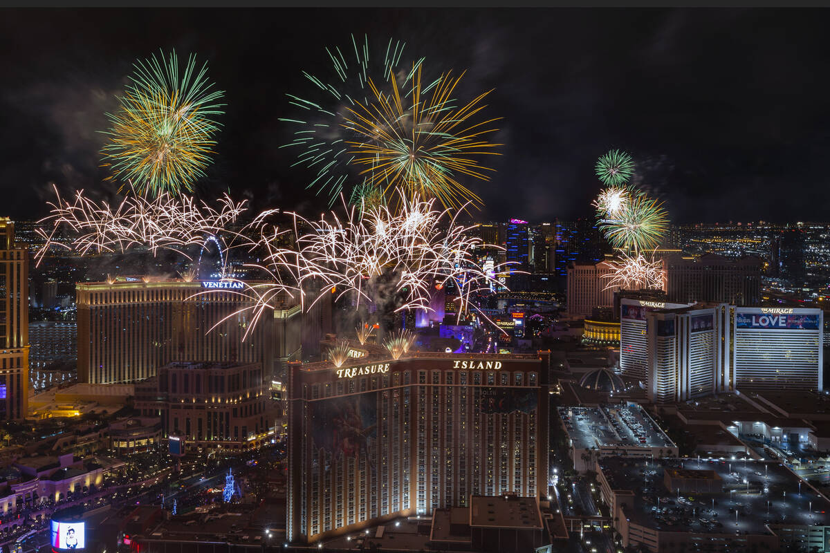 New Year’s Eve fireworks erupts above the Strip viewed from atop the Trump Tower on Sund ...