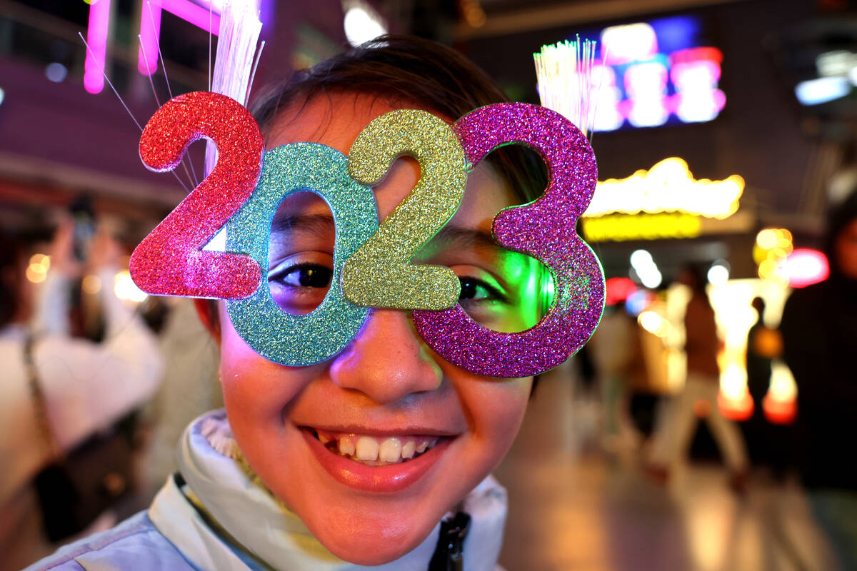 Mia Preciado 8, of Mexico celebrates on New Year’s Eve at the Fremont Street Experience ...