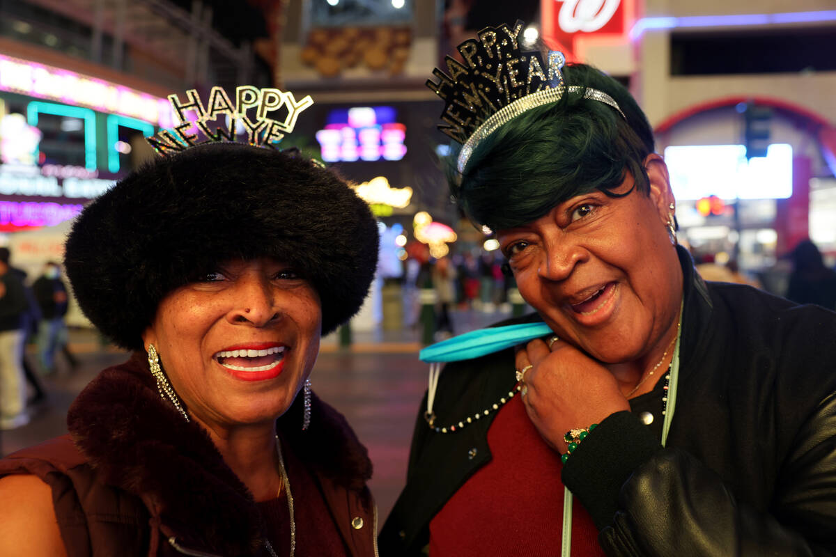 Stephanie Landry, 61, left, and her aunt Reyvada Thomas, 67, both of Los Angeles, celebrate on ...