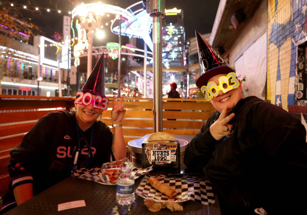 Brenda Woodward, left, and her wife, Michelle Woodward, “carb load” at Evel Pie on East Fre ...