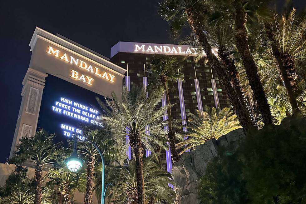 A sign at Mandalay Bay warns that winds could delay the start of fireworks on New Year's Eve on ...