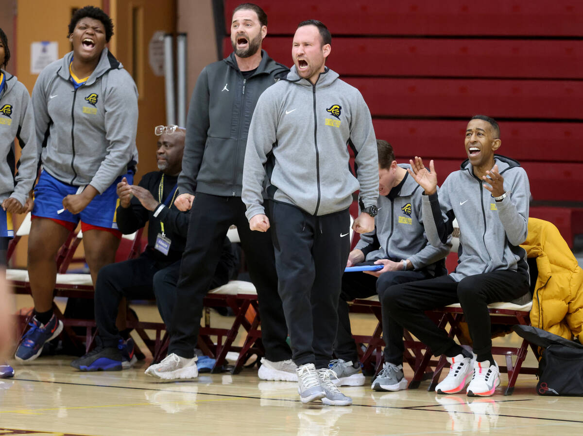 Democracy Prep assistant coach Mark Coleman, right, during a game against Anchorage Christian S ...