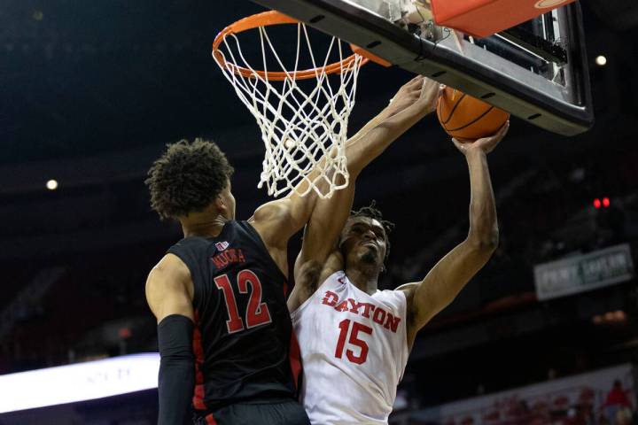 Dayton Flyers forward DaRon Holmes II (15) shoots against UNLV Rebels center David Muoka (12) d ...