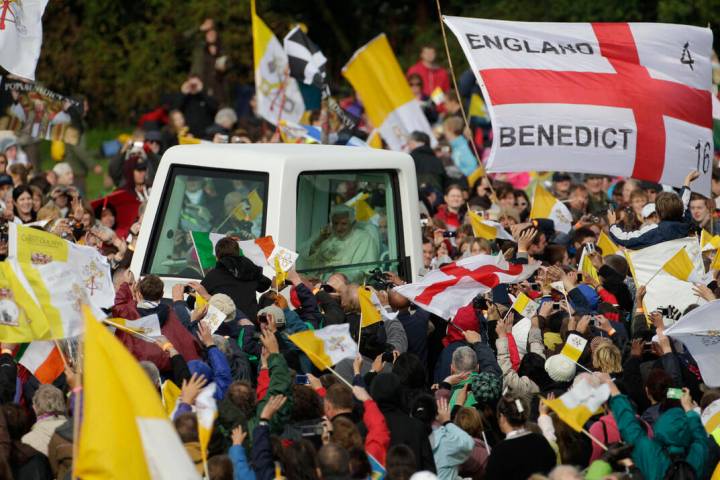 Pope Benedict XVI is cheered by faithful upon his arrival in Cofton park to celebrate a beatifi ...