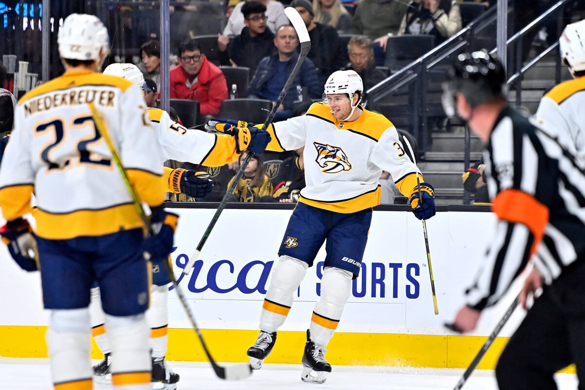 Nashville Predators defenseman Jeremy Lauzon (3) reacts after scoring against the Vegas Golden ...
