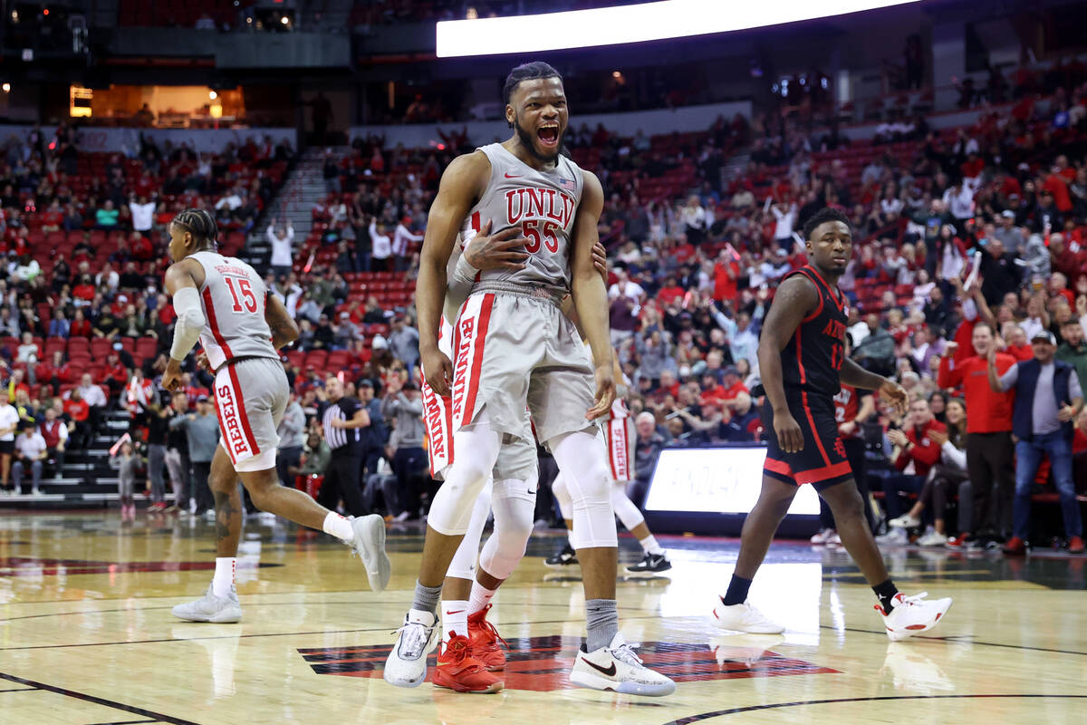 UNLV Rebels guard EJ Harkless (55) reacts after dunking the ball for a score during the second ...