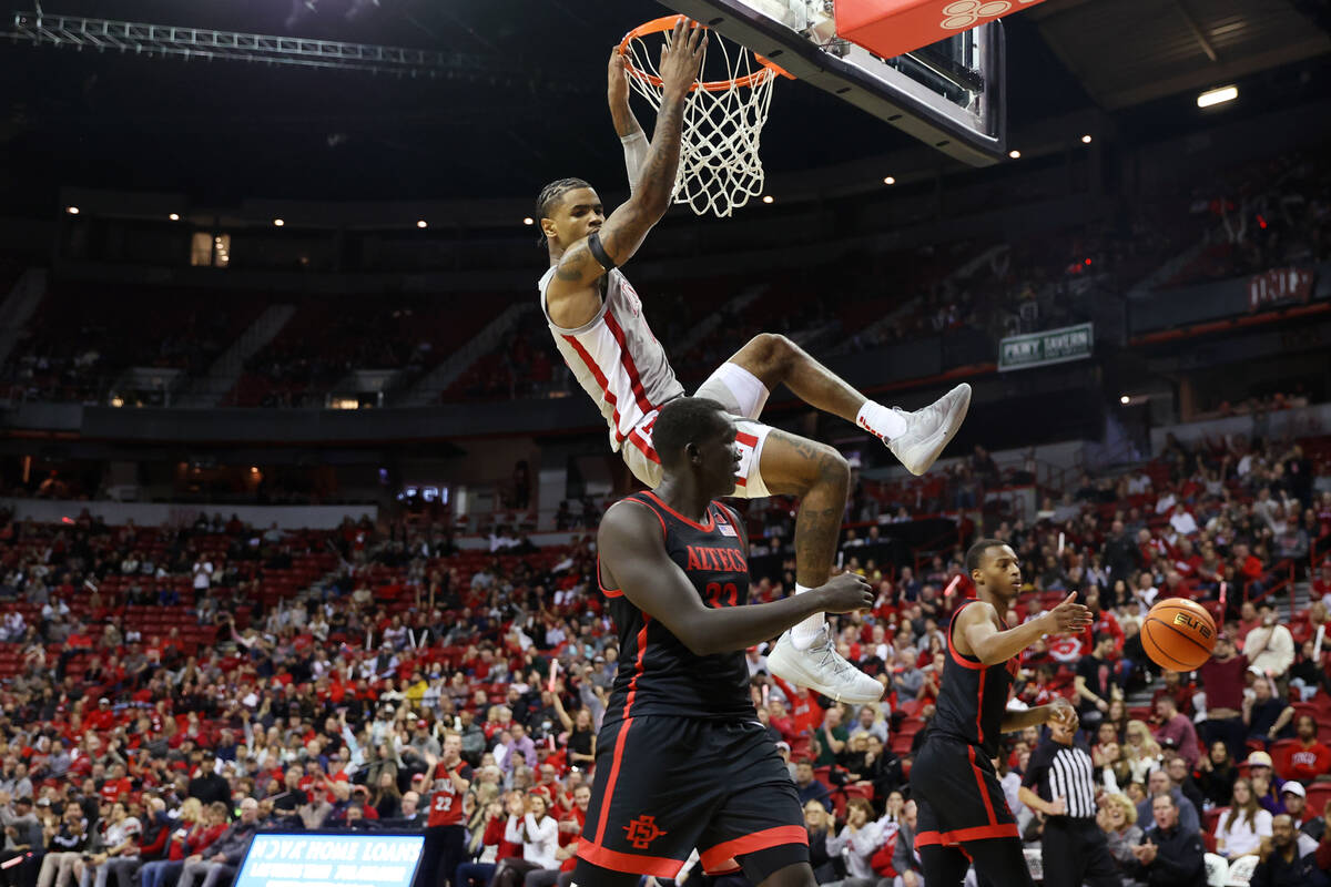 UNLV Rebels guard Luis Rodriguez (15) dunks the ball during the second half of an NCAA college ...