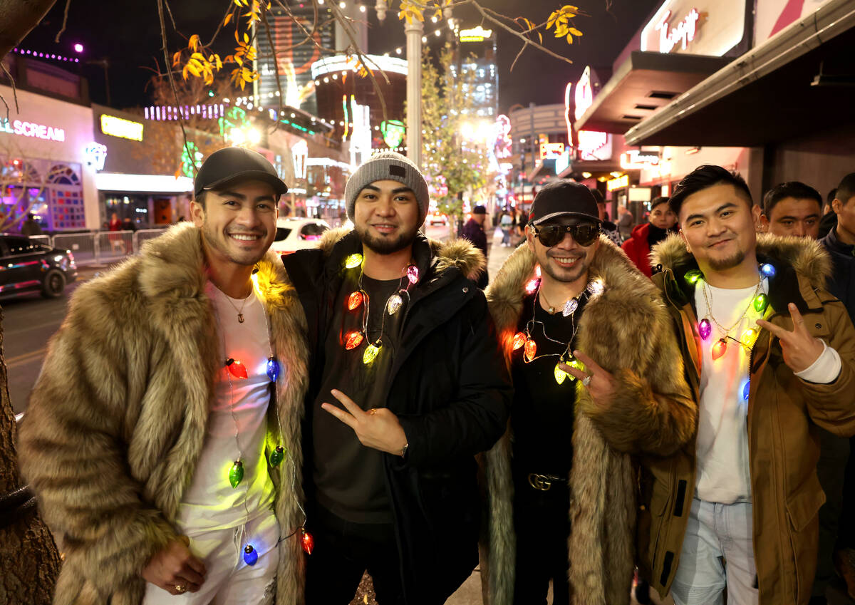 Revelers, from left, Joe Doruelo, Rob Ramos, Jas Villa and Mark Cruz, all of San Francisco, cel ...