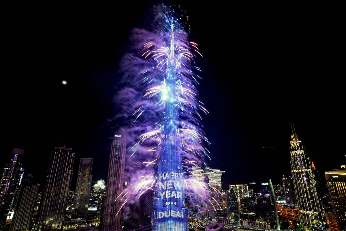 Fireworks explode at the Burj Khalifa, the world's tallest building, during the New Year's Eve ...