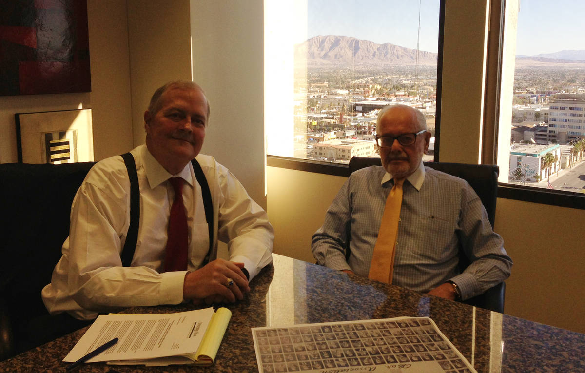 Sam Lionel, right, co-founder of Lionel Sawyer & Collins, sits in the conference room at Fennem ...