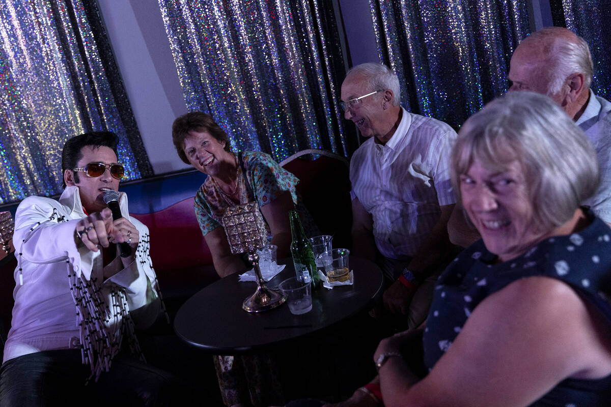 Vegas Elvis Tribute Artist Steve Connolly interacts with guests during his "Spirit Of The ...