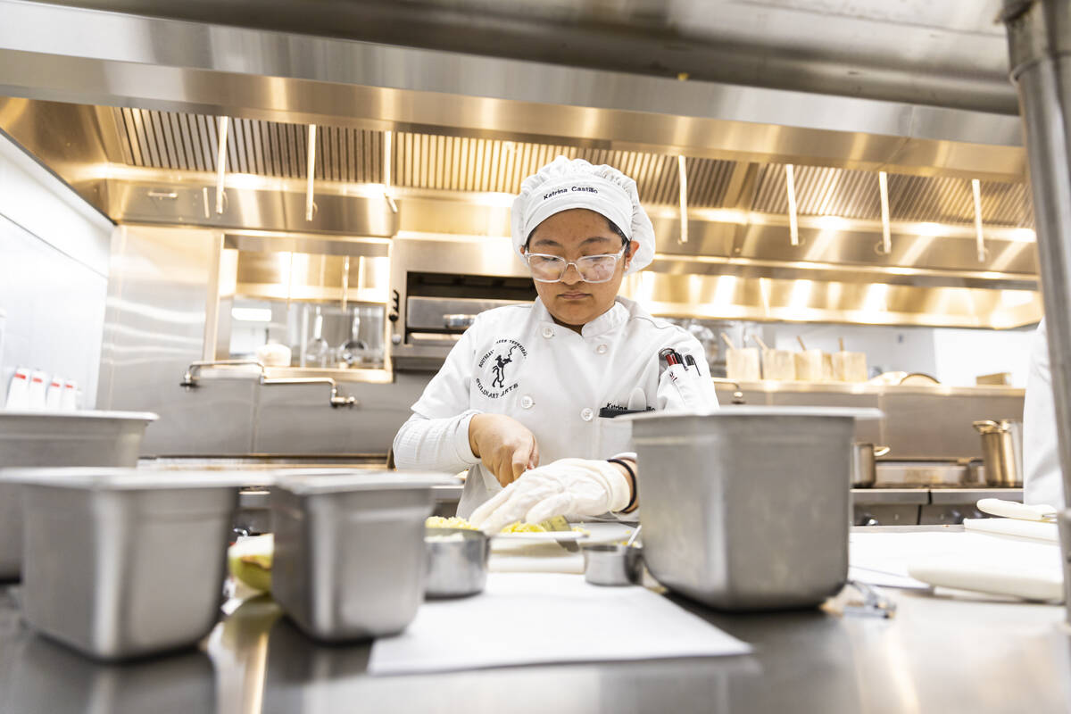 Southeast Career Technical Academy student Katrina Castillo preps food in the kitchen on Tuesda ...