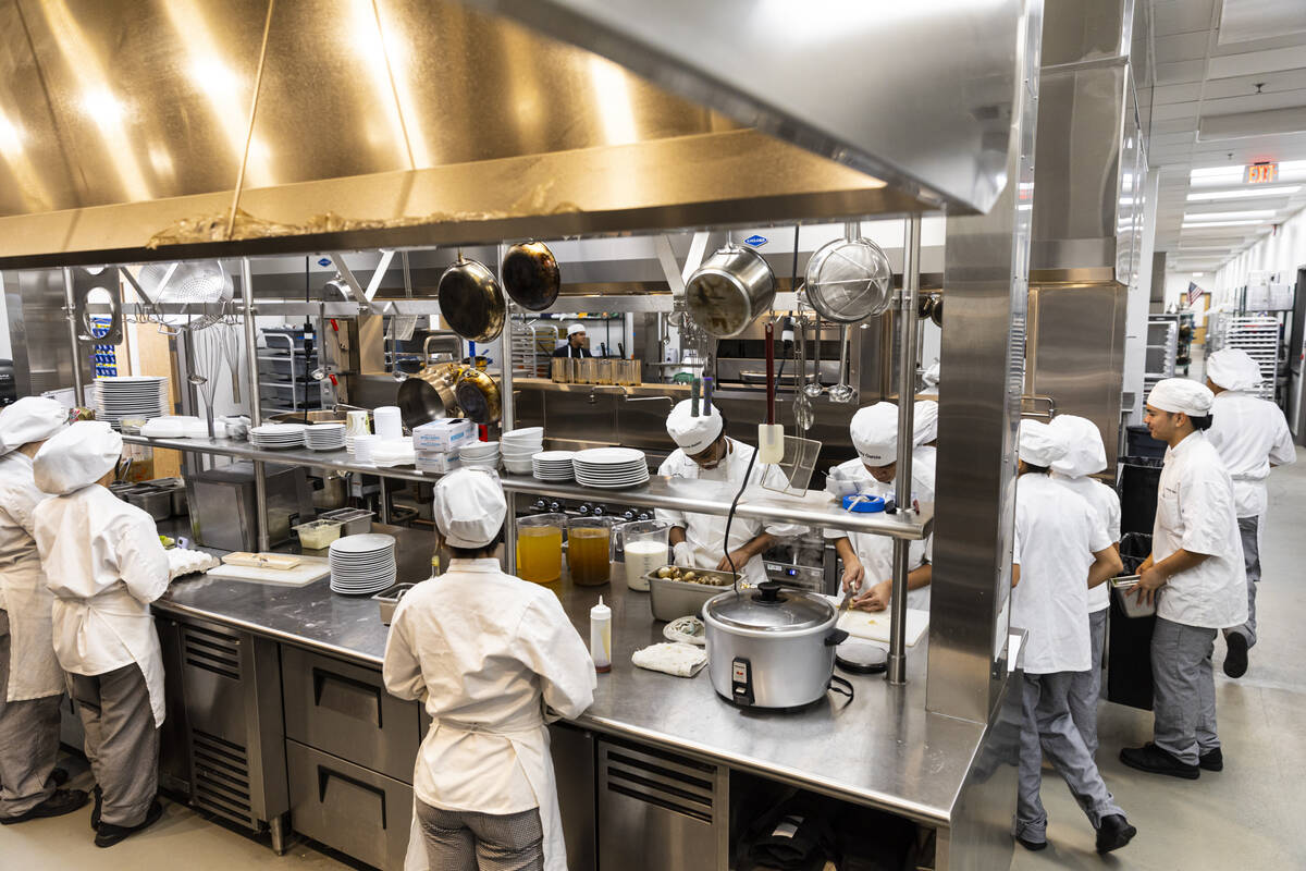 Southeast Career Technical Academy culinary students work in the kitchen on Tuesday, Dec. 6, 20 ...