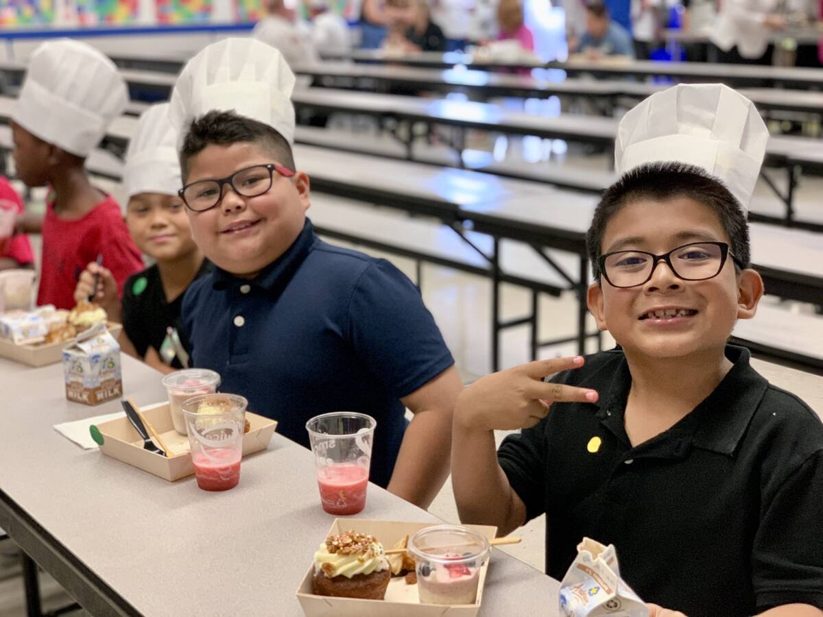 Students at Wynn Elementary School earlier receive a breakfast last year from Chefs for Kids. ( ...