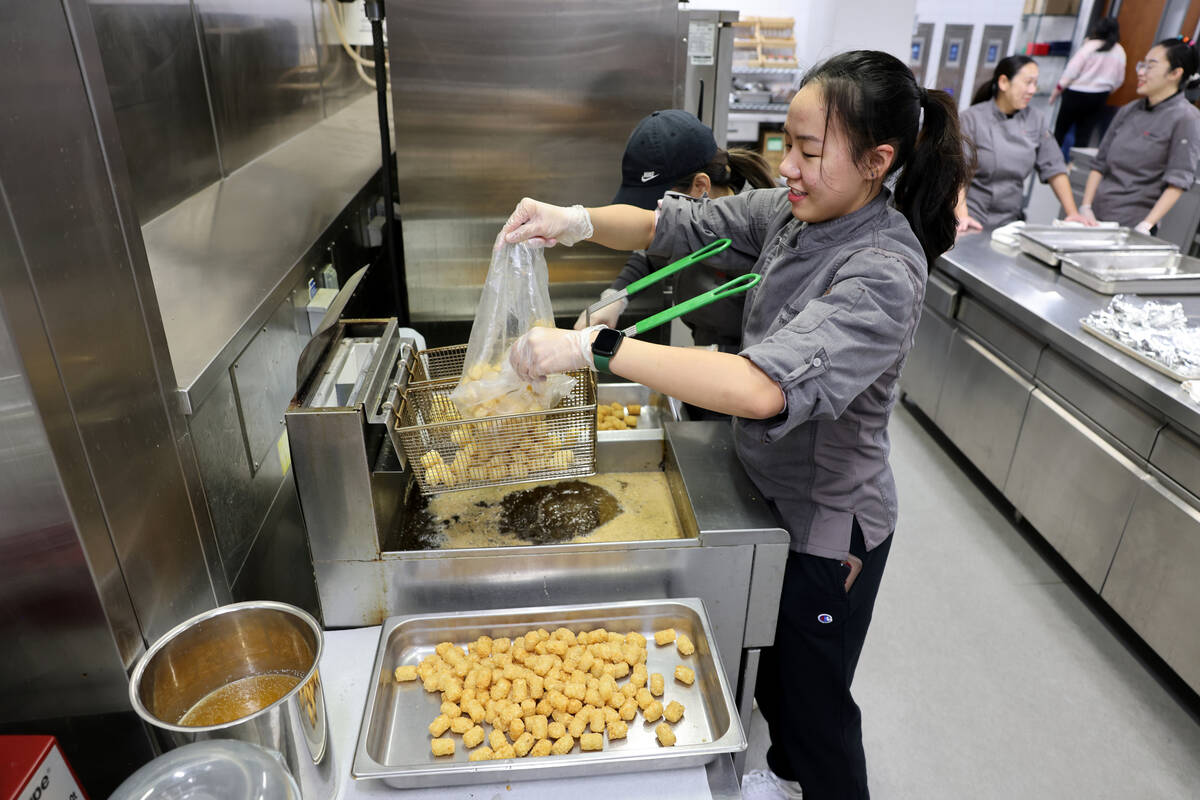 UNLV students, including Minh Nguyen, prepare breakfast at Harrah College of Hospitality for ab ...