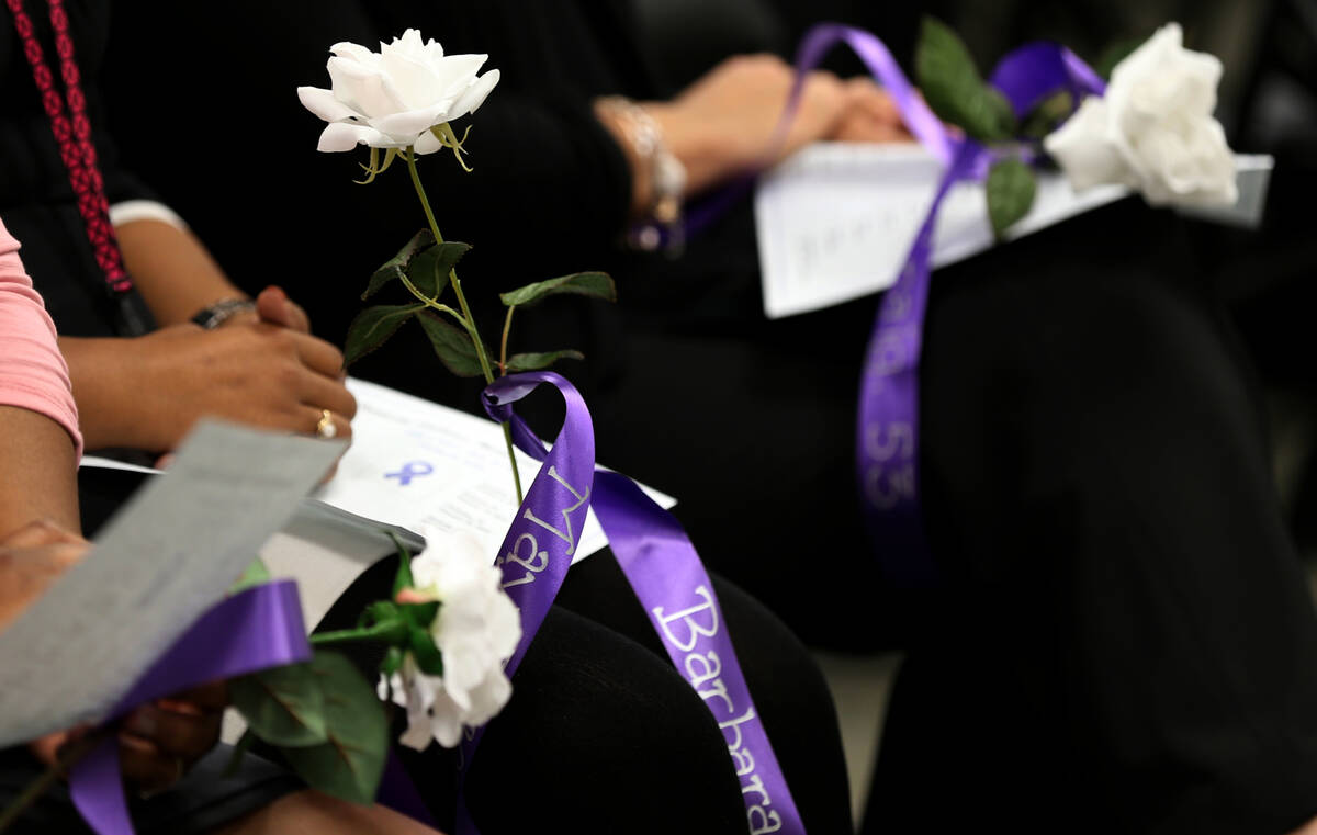 Roses with names are seen during a ceremony at the Southern Nevada Family Justice Center in Las ...