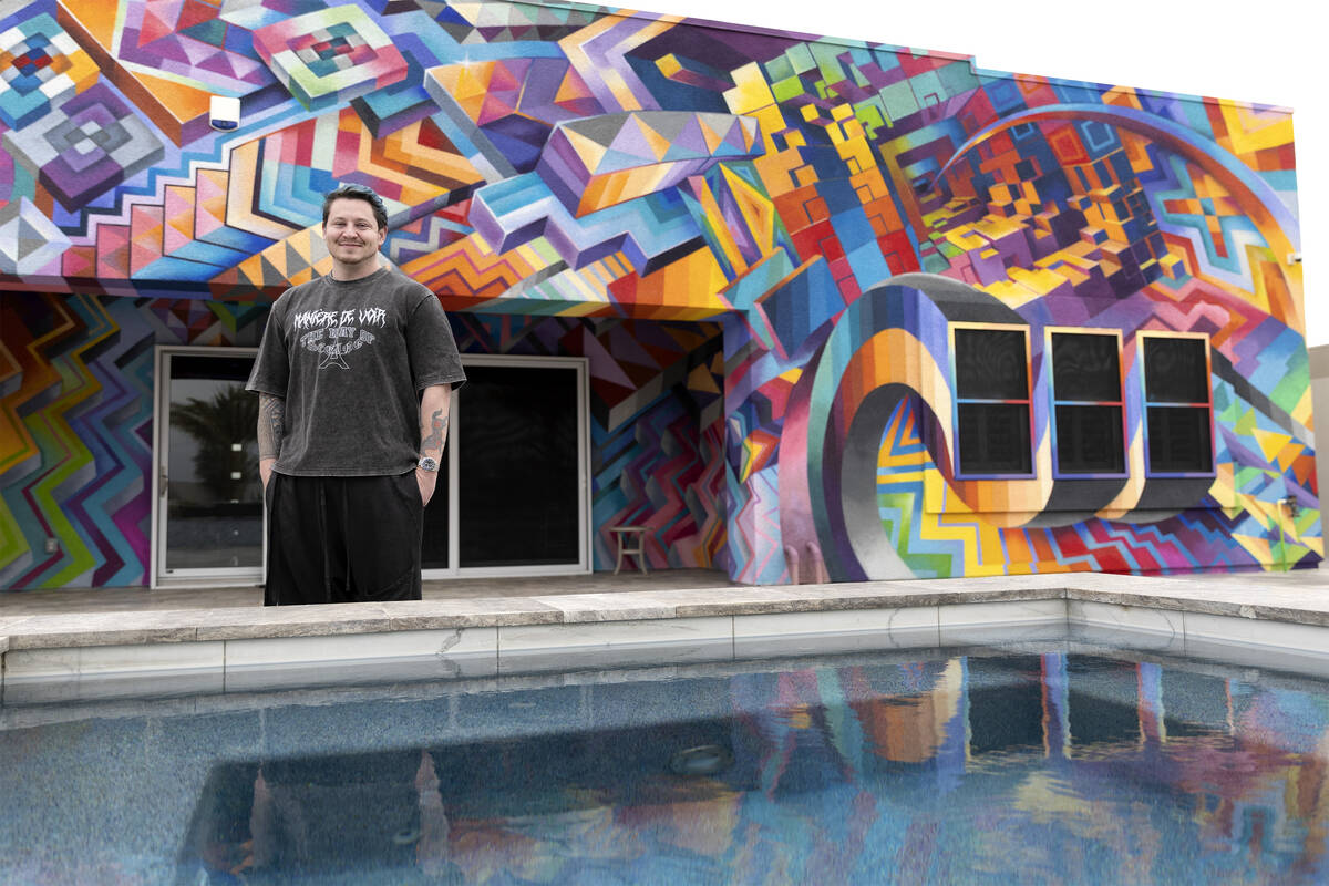 Brandon Bowsky, who had a large mural painted on two sides of his house, in front of the art pi ...