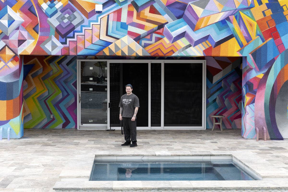Brandon Bowsky, who had a large mural painted on two sides of his house, in front of the art pi ...