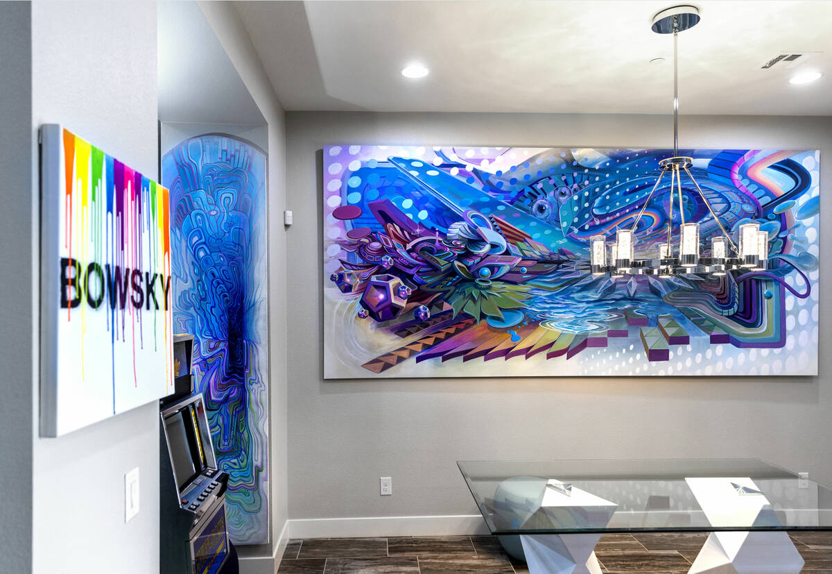 Various art pieces on the interior walls of Marketing CEO Brandon Bowsky's home which he had a ...