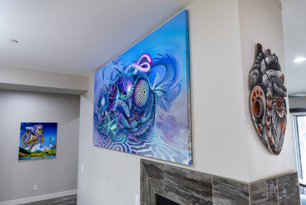 Various art pieces on the interior walls of Marketing CEO Brandon Bowsky's home which he had a ...