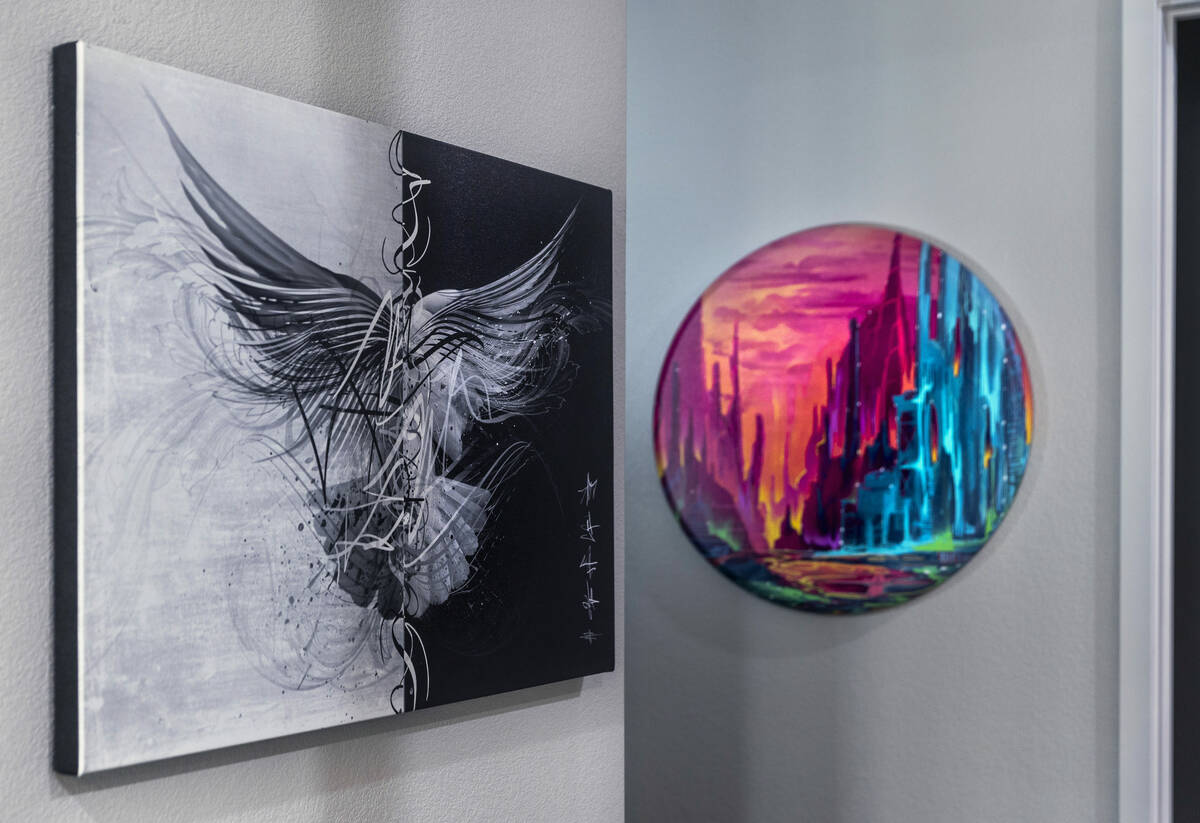 Various art pieces on the interior walls of Marketing CEO Brandon Bowsky's home which he had a ...