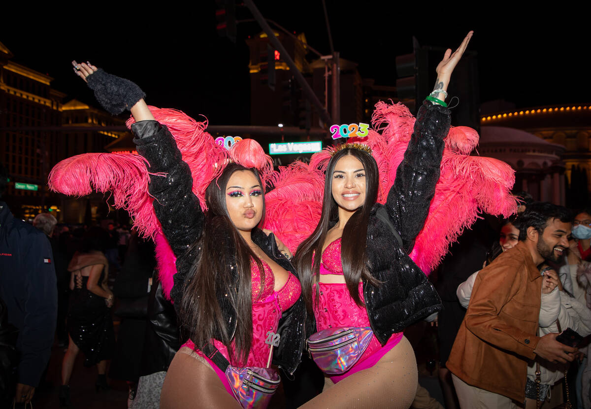 Showgirls Linda Terry, left, and Bri, right, pose for a photo on the Strip on Saturday, Dec. 31 ...