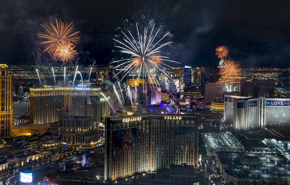 New Year’s Eve fireworks erupt above the Strip viewed from atop the Trump Tower on Sunda ...